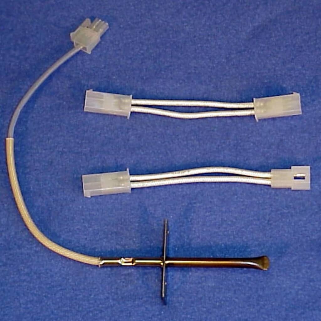 An appliance broil heating element with a double U-shaped coil, viewed from above.