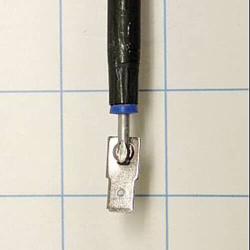 A simplified, black-and-white line drawing of an M-shaped heating element.