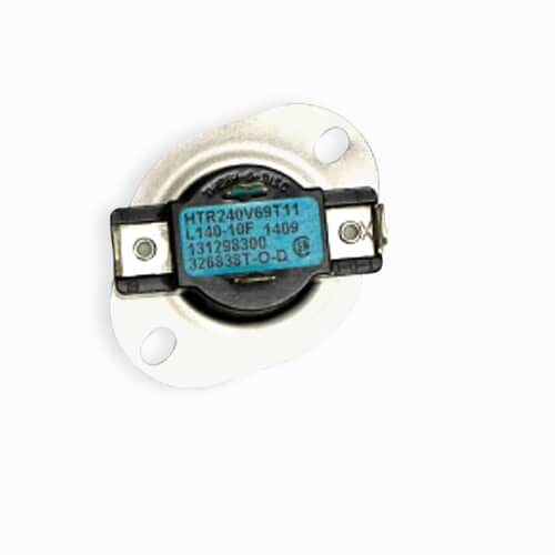 The thermostat component with its silver mounting plate resting on a white grid, showing the two electrical spade terminals.