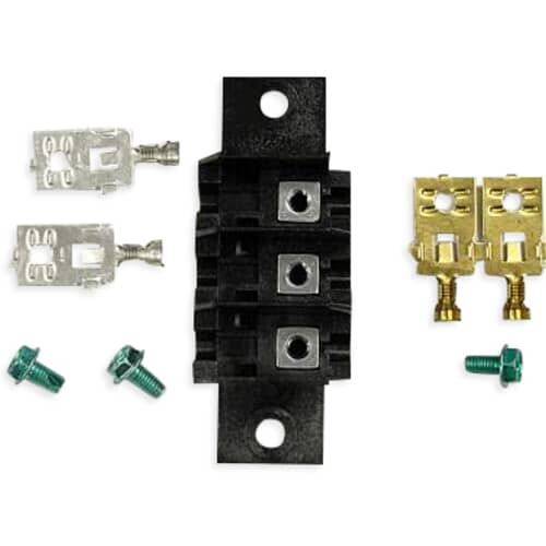 A view of the terminal block showing the three screw terminals centered vertically, flanked by different styles of wire connectors.