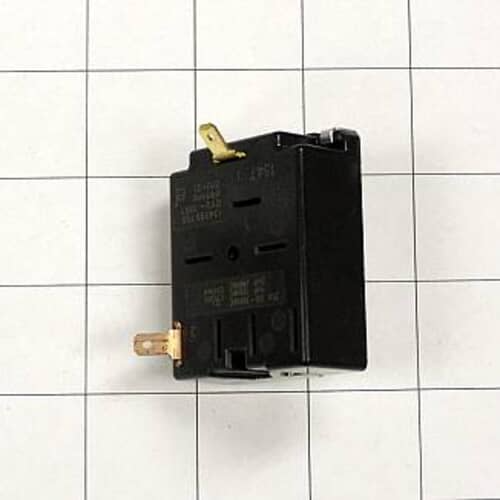 A black rectangular electronic switch module with gold spade terminals, set on a white grid background.