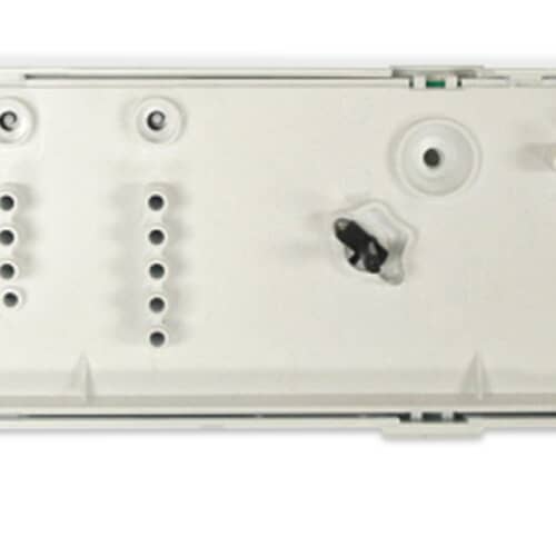 A close-up of the front/top of the white control board housing, showing the mounting points and wiring harness connector sockets.