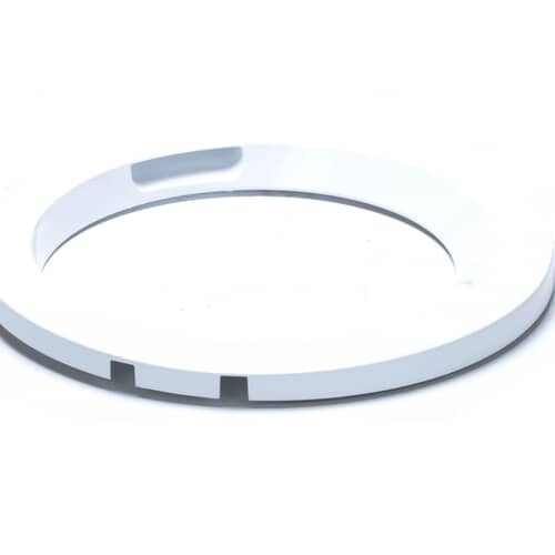 A flatter, slightly angled view of the white washer door panel.