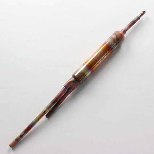 Close-up view of the central bulb section of the sensor, showing oxidation/coloring from use against a white background.