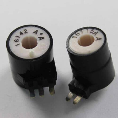 A clearer view of the coil ends, displaying the white plastic face and the three gold-colored spade terminals protruding from the side.