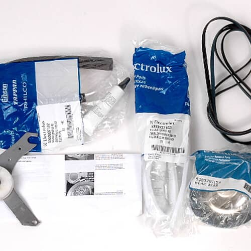 A wider shot of the kit contents, including blue and white packaging sleeves, against a white and blue background.