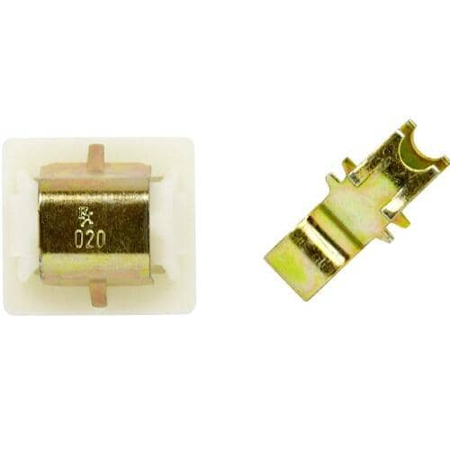 The switch component viewed from the back/side against a white grid, showing the metal casing and terminals.