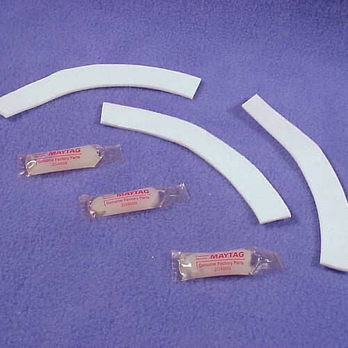Whirlpool 203956 damper pads with small Maytag labeled lubricant packets