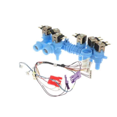 View of the valve body showing the blue solenoid casings and the outlet ports.