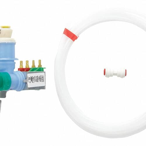 A detailed view of the valve body, showing the blue/green solenoid caps and the electrical spade terminals at the bottom.