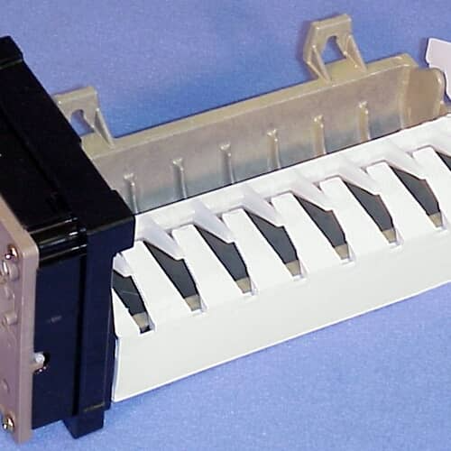 Side view of the ice maker showing the housing structure and the end connections against a white background.