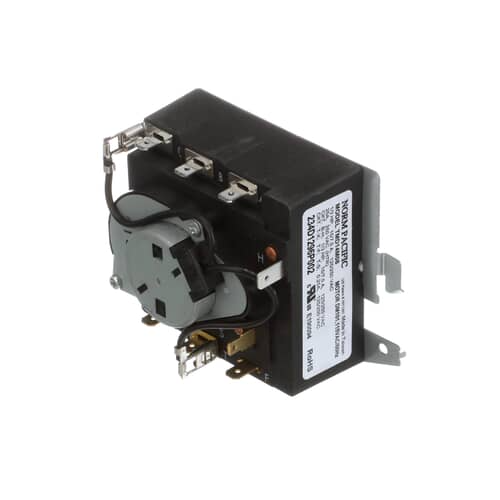 Angled view of the black control timer showing the attached rotary switch mechanism and the "NORMA PACIFIC" label.