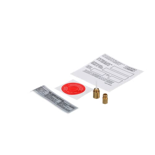 Detail view of the two brass orifice fittings included in the conversion kit