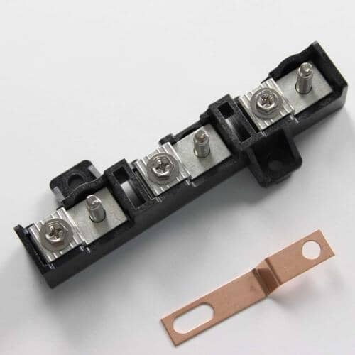 Appliance terminal block with three brass nuts.