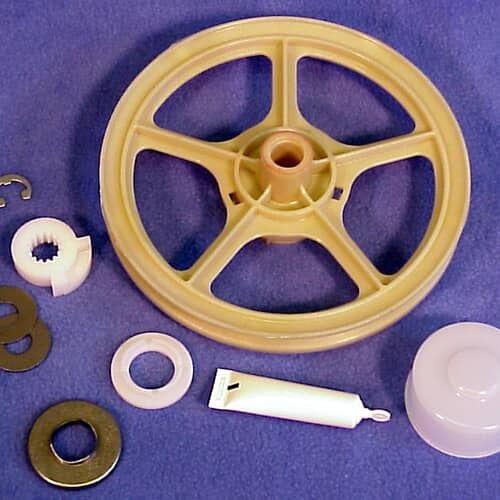 Full view of the Whirlpool washer thrust bearing kit on a purple background