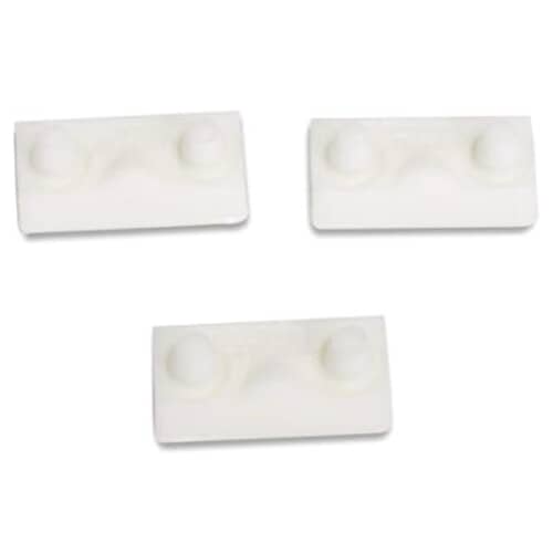 Top view of the three white Whirlpool 285219 suspension pads against a grid background