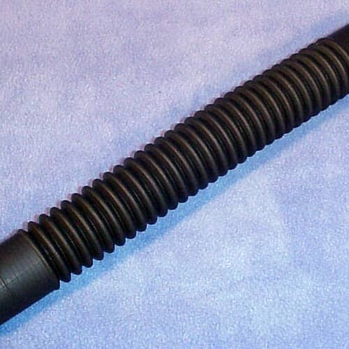 Close-up of the black corrugated Electrolux washer hose centered on a white grid background, showing the deep ribbing.