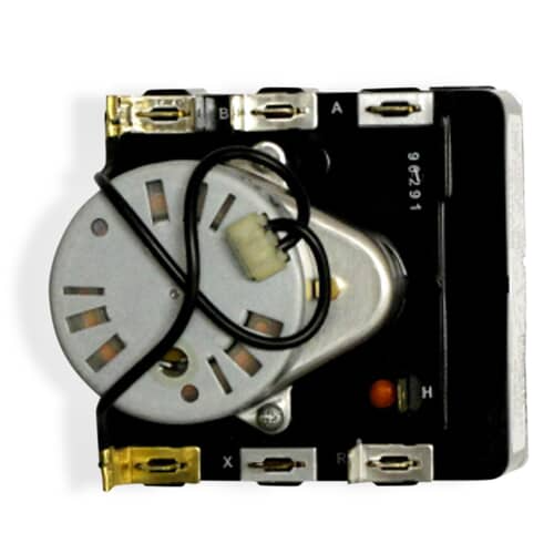 Close-up view of the silver circular timer motor and the attached wiring harness connection point on the main body.