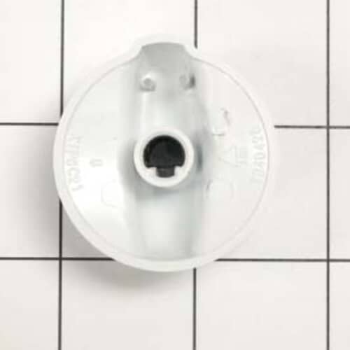 The rear of the white rotary knob against a grid background, showing the central black coupling for mounting onto the control shaft.