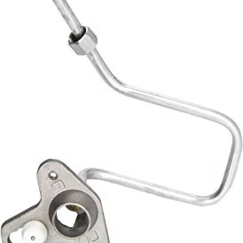 Close-up of the spark electrode and brass gas orifice on the Frigidaire 316237805 assembly.