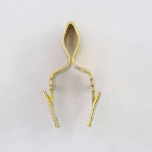 A gold-colored metallic door strike clip shown head-on against a plain white background.