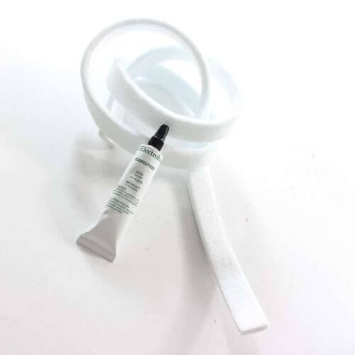 The gray felt dryer seal coiled into a loop next to a small white tube of Electrolux-labeled high-temperature adhesive.