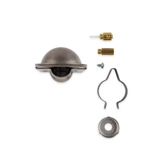 The components of the conversion kit separated: the shiny metal shield, two brass orifice fittings, and a black screw, against a white background.