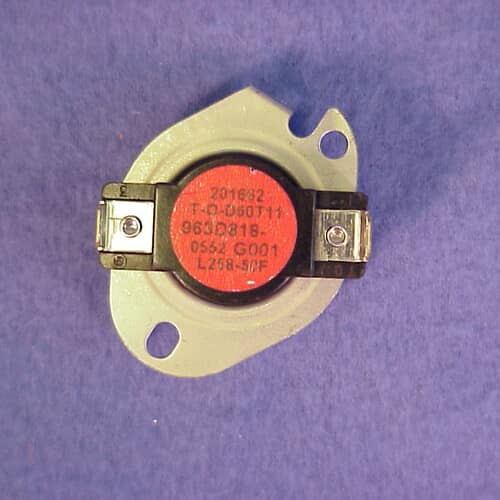 The thermostat assembly shown against a purple/blue fabric background, featuring two spade terminals ready for wiring.