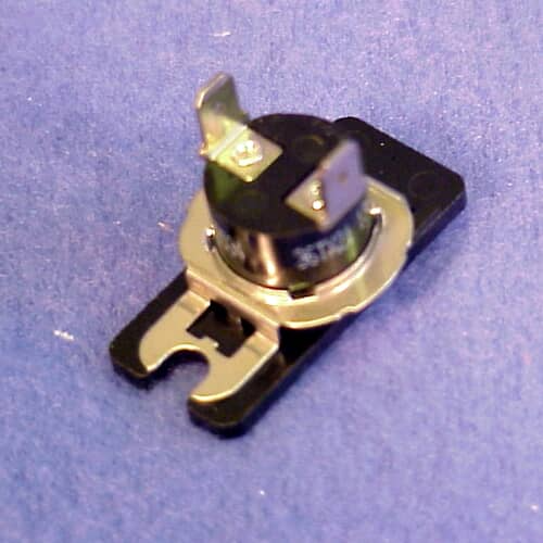 The safety thermostat component against a purple background, showing the snap-in mounting mechanism on the plastic base.