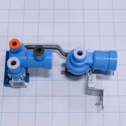 Top-down view of the blue water inlet valve assembly on a grid for size reference