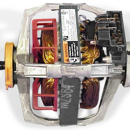 Internal view of the washer drive motor showing the windings, carbon brush housing, and a red cooling fan component.