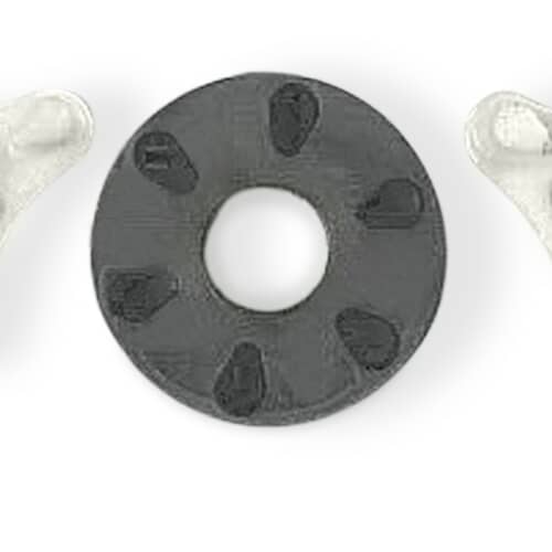 Close-up view of the black rubber drive block/hub component of the coupler
