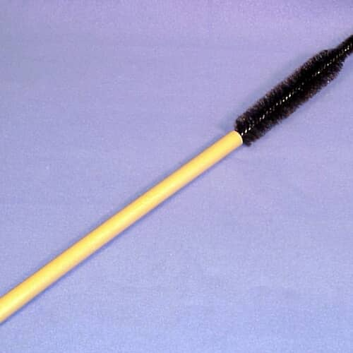 Close-up view of the black bristles on the Whirlpool 4210463RW cleaning brush
