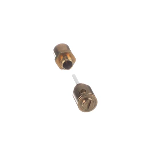 An angled view of the brass orifice parts, one showing a white plastic rod extending from it.