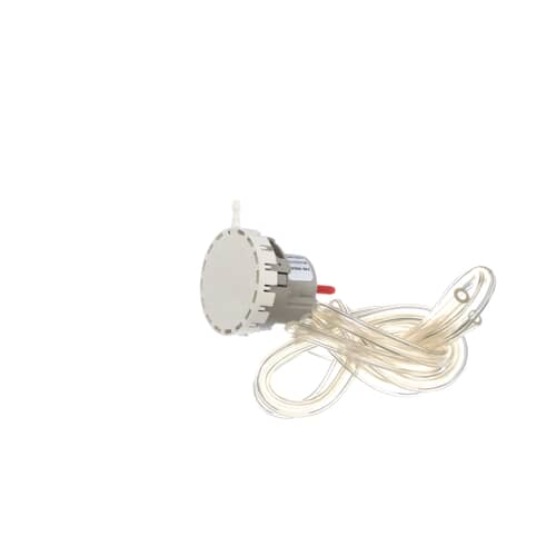 Close-up of the clear tubing attached to the pressure switch outlet port.