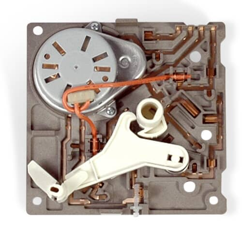 Front view of Whirlpool W10190935 ice maker motor module showing internal gears and copper wiring.