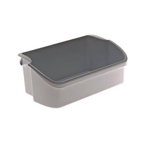 View of the door bin showing a darker trim or handle indentation along the top edge.