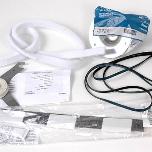 Layout of the kit contents including the dryer belt, idler pulley assembly, drum bearing, and lubricant.
