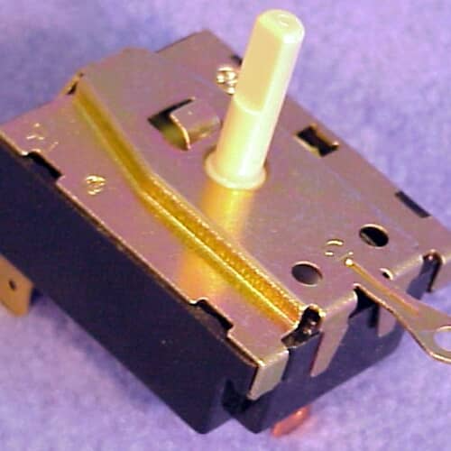 Close-up of the metal frame of the GE rotary switch, showing labeling and terminal mounts