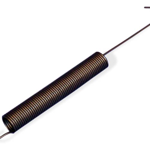 Close-up view focusing on the tightly wound coils of the dark-colored spring