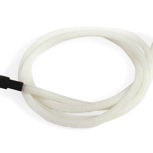 Close-up view of the corrugated texture on the white Whirlpool drain hose