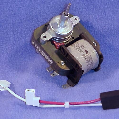 Angled view showing the dark housing, the motor windings, and the white label with electrical specifications.